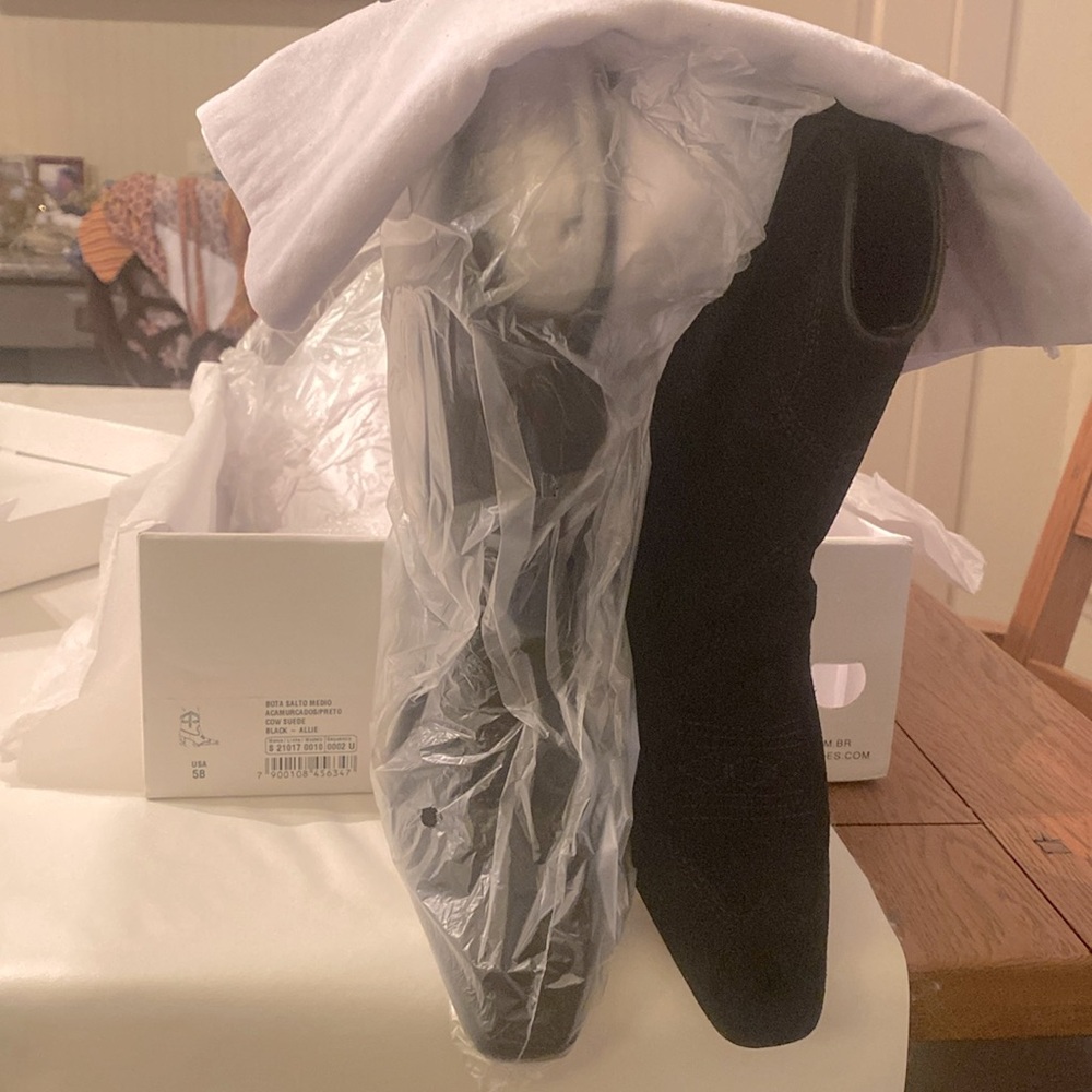 Beautiful, black suede SCHUTZ booties.  Brand new, gorgeous condition.